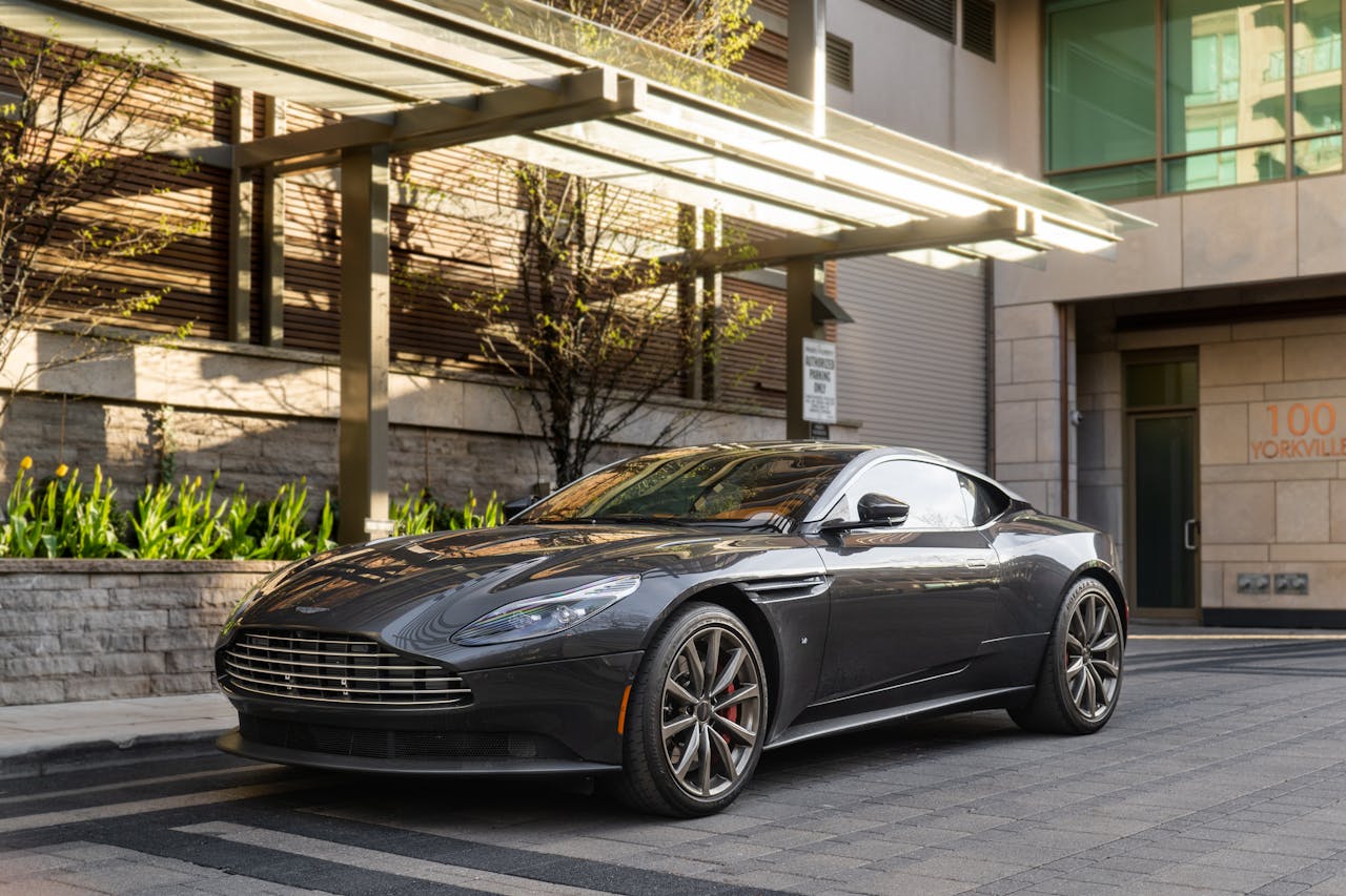 Sleek Aston Martin DB11 parked at Yorkville, Toronto, showcasing modern luxury.